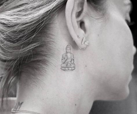 Buddha tattoo behind the right ear. Buddhist Symbol Tattoos, Buddha Tattoo Sleeve, Buda Tattoo, Tattoo Fairy, Behind Ear Tattoos, Tato Minimal, Buddhist Tattoo, Buddha Tattoo Design, Polynesian Tattoos