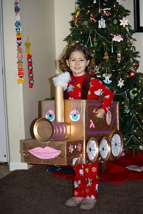 My daughter's homework assignment was to make a Polar Express train car to be used in the school's annual Polar Express Ride.  I wanted my ... Polar Express Box Car Parade, Polar Express Cardboard Train Boxes, Polar Express Box Train Ideas, Polar Express Train Cardboard Parade, Polar Express Box Car Ideas, Diy Polar Express Train Cardboard Boxes, Polar Express Train Box Car Ideas, Box Car Ideas, Diy Polar Express Train