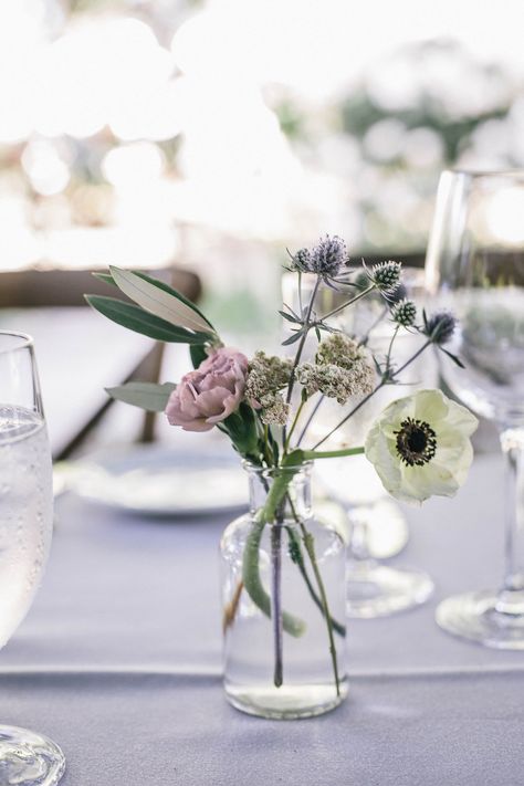 Bud vase centerpiece with anemone, carnation, olive, and thistle for a wedding with a lavender color scheme. Campovida wedding by Lily + Mint. Photo by Melissa Fuller Photography. Bud Vase Centerpiece, Anemone Wedding, Wedding Motifs, Unique Wedding Flowers, Wedding Floral Centerpieces, Flower Centerpieces Wedding, Easter Centerpieces, Deco Floral, Vase Centerpieces