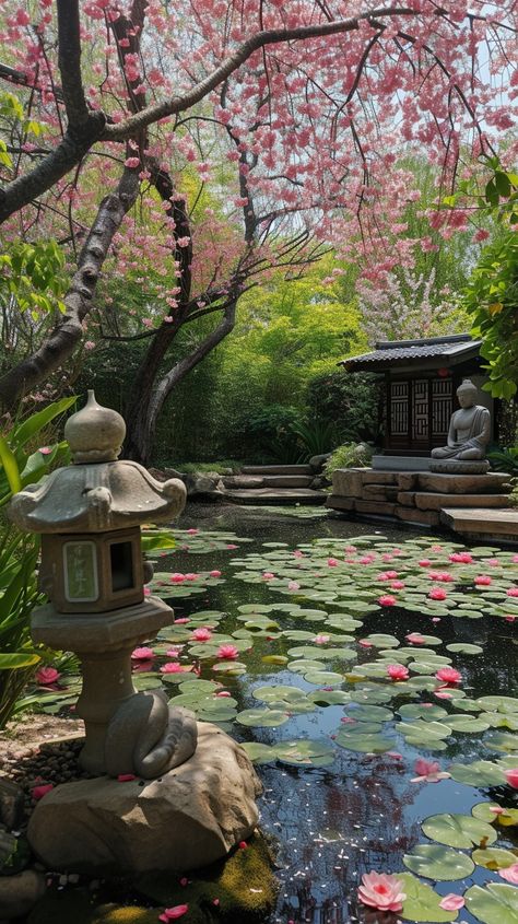 Serene Garden View: A tranquil Japanese garden with cherry blossoms, a stone lantern, and a pond with lily pads. #garden #cherry #blossoms #pond #lily #pads #stone #lantern #aiart #aiphoto #stockcake https://ayr.app/l/uz2E Lily Pond Garden, Japanese Garden Photography, Japanese Cherry Blossom Festival, Japanese Zen Aesthetic, Japanese Garden Flowers, Japan Garden Aesthetic, Magical Landscapes Photography, Nature Connected Minimalism, Magical Garden Aesthetic