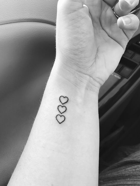 Finally got my tattoo. Three hearts to represent my kids! Children Tattoos, Little Heart Tattoos, Heart Tattoo Wrist, Small Heart Tattoos, 4 Tattoo, Inspiration Tattoos, Heart Tattoo Designs, Wrist Tattoos For Women, Tattoo Cover