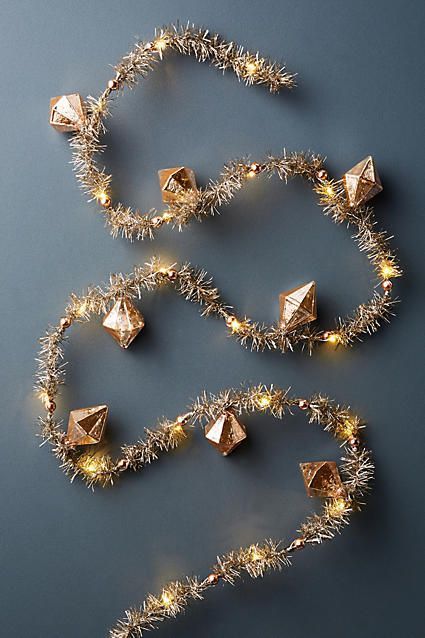 Anthropologie Blushing Tinsel Garland | Christmas Decor | Holiday Inspiration Anthropologie Holiday Decor, Pink Home Accessories, Rose Gold Christmas Decorations, Anthropologie Christmas, Anthropologie Holiday, Rose Gold Christmas, Millennial Pink, Tinsel Garland, Gold Holiday