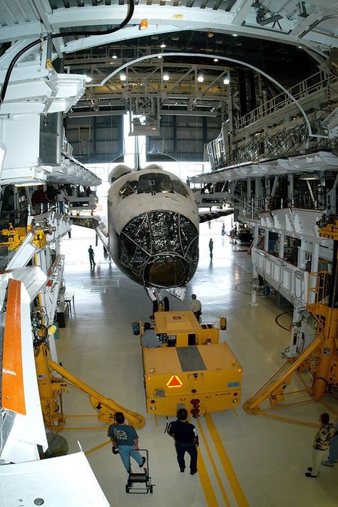 Workers prepare to tow Space Shuttle orbiter Atlantis from the OPF to the VAB. The move will allow work to be performed in the OPF that can only be accomplished while the bay is empty. Atlantis will remain in the VAB for about 10 days, then return to the OPF as work resumes to prepare it for launch in Sept 2004 on the first return-to-flight mission, STS-114. 12/05/2003. Credit: NASA Nasa Internship, Aviation Engineering, Nasa Engineer, Aerospace Design, Nasa Space Program, Space Engineers, Space Camp, Nasa Space Shuttle, Career Vision Board