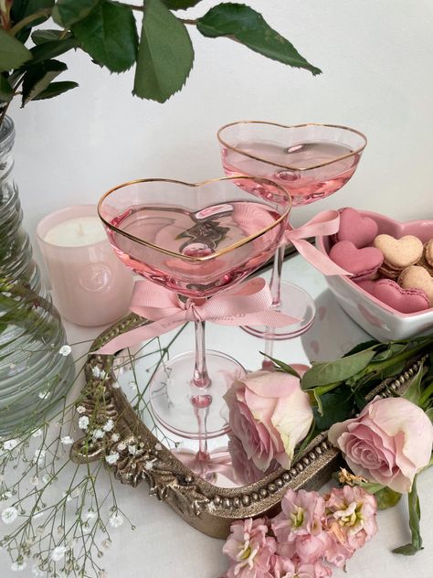 Heart shaped glasses, wine glass, martini glass, cocktail, coquette, pink, girly, valentine’s day inspo, roses, heart shaped macarons, mirror tray Rose Wine Glass Aesthetic, Drink Tray Ideas, Different Glasses For Drinks, Pink Cocktail Glasses, Heart Shaped Champagne Glasses, Heart Shaped Wine Glasses, Heart Wine Glasses, Cute Drink Glasses, Pretty Wine Glasses