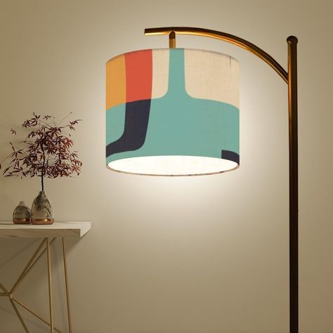 Perfect for living rooms, bedrooms, and offices, this lamp adds a touch of elegance and style. Its sleek design and clean lines will surely impress your guests. Say goodbye to boring lighting and hello to sophistication! Material: Linen + Metal Product Dimensions: Overall size: 60" x 10" Shade height: 9" Shade diameter: 11" Design Details: Single-sided printing Printing Technique: UV Printing Product Features: This floor lamp includes a rotating lamp holder that can swivel up to 180o, allowing you to adjust the light angle precisely for different tasks. It comes with a remote-controlled LED bulb that offers stepless brightness adjustment from 5% to 100% and color temperatures ranging from 3000K to 6500K to suit your needs. The lamp is operated with a convenient footswitch, making it easy t Mid Century Modern Dinner Room, Mid Century Modern Foyer, Midcentury Modern Lamp, Retro Home Decor Mid Century, Japanese Mid Century Modern, Midcentury Lighting, Retro Floor Lamp, Mid Century Modern Floor Lamp, Mid Century Entryway