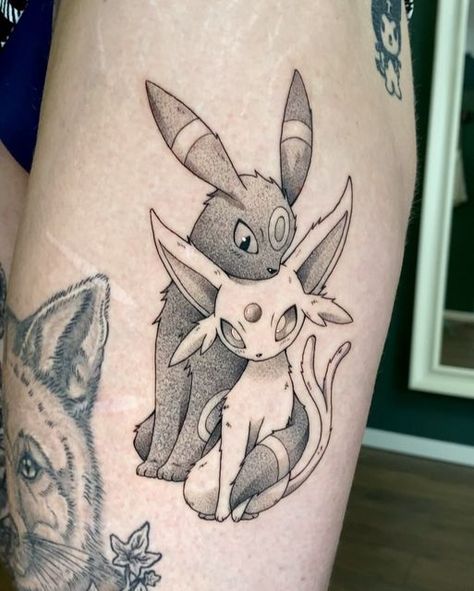 Belzebub Anime Tattoo Artist on Instagram: "Espeon & Umbreon | Pokémon ✨  Thanks for your trust @onecrazymind 🤘🏻☺️ . . . . . . . . #pokemon #pokémon #pokemonart #pokemontattoo #gamerink #animetattoo #animetattoos #animemasterink #customtattoo #espeon #umbreon #espeonxumbreon #pokemoncommunity #pokemoncenter #pokemonfan #pokemonfanart #animemasterink #animetattooartist #nachtara #psiana" Umbreon And Sylveon Tattoo, Pokemon Tattoo Pokeball, Pokemon With Knife Tattoo, Jirachi Pokemon Tattoo, Rapidash Pokemon Tattoo, Umbreon And Espeon Matching Tattoos, Shiny Umbreon Tattoo, Pokemon Friendship Tattoo, Small Eevee Tattoo