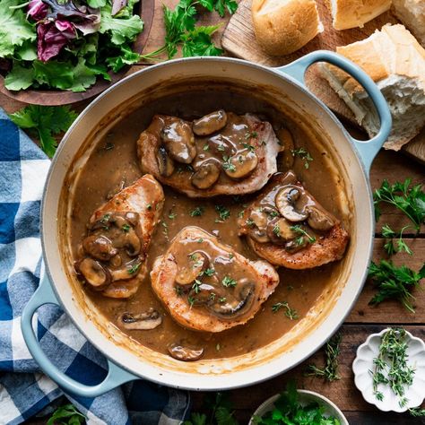 Easy Dutch Oven Pork Chops with Mushroom Gravy - The Seasoned Mom Dutch Oven Pork Chops, Pork Chops With Mushroom Gravy, Dutch Oven Pork, Baked Stuffed Pork Chops, Rosemary Pork Chops, Oven Pork Chops, Perfect Pork Chops, Bbq Pork Chops, Pork Chops And Gravy