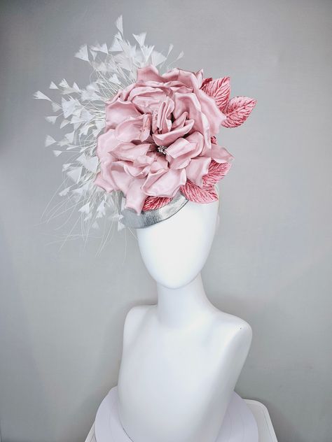 From the 2024 Featured Milliner of the Kentucky Derby Museum  Gorgeous Kentucky Derby hat fascinator  kentucky derby hat fascinator silver metallic with large blush pink satin flower and pink velvet leaves, and white branching feathers headband attachment each hat is totally one of a kind! no two are alike! I can probably add feathers, flowers etc to existing hats for a small fee. I cannot remove anything from existing hats. Just message me and see if we can make it work! :) I cannot make custom Derby Dresses And Hats Outfit, Classy Hats, Derby Hats Fascinators, Derby Dress, Easter Hats, Feather Headband, Kentucky Derby Hat, Satin Flowers, Fancy Hats