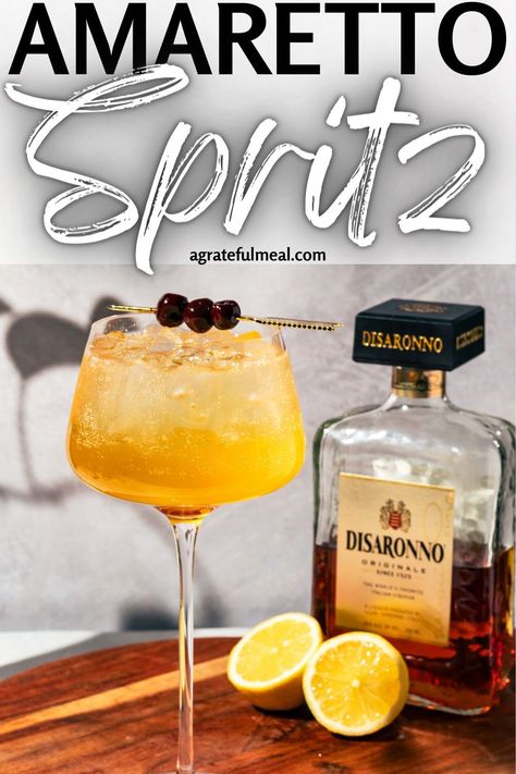 Master the perfect Amaretto Spritz cocktail with this easy recipe. A delightful mix between an Amaretto Sour and an Italian Spritz, featuring Disaronno and cherries. Ideal for those seeking simple, yet sophisticated cocktail ideas. Perfect for any season but is definitely a great spring or summer cocktail. Cocktail Recipes With Prosecco, Aperol Drinks Cocktail Recipes, Amaretto Cocktails Recipes, Preseco Cocktail, Prosseco Cocktails Recipe, Summer Spritzer Cocktails, Amaretto Spritz, Italian Alcoholic Drinks, Amaretto Drinks Cocktails