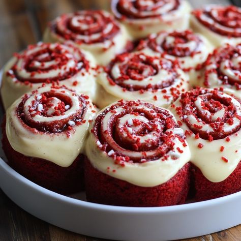 🎂 Indulge in These Irresistible Red Velvet Cinnamon Rolls! ❤️ Meet your new favorite treat—Red Velvet Cinnamon Rolls, where the classic flavor of red velvet meets the gooey, sweet perfection of cinnamon rolls! Topped with creamy cream cheese frosting and sprinkled with red velvet crumbs, these rolls are as beautiful as they are delicious. Perfect for a special breakfast, brunch, or a sweet afternoon delight! 🌟 Ingredients: 3 cups all-purpose flour 1/4 cup granulated sugar 1 packet active dr... Red Velvet Food Photography, Valentine Cinnamon Rolls, Red Velvet Cinnamon Rolls, Red Velvet Donuts, 2025 Moodboard, Red Desserts, Red Velvet Recipes, Cinnamon Roll Bake, Special Breakfast