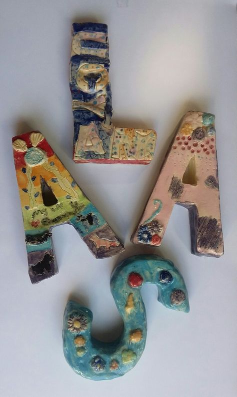 Ceramic Letters Ideas, Elementary School Clay Projects, Kids Ceramics Projects, Clay Draping, Clay Lesson Plans, Clay Letters, Ceramic Letters, Clay Embellishments, High School Ceramics