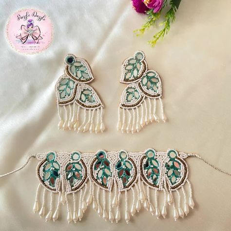 Hey all jewellery lovers! 👋 We are here with a colourful set of beaded necklaces and earrings set that will go well with all your traditional outfits. ❤️ The vibrancy of this set will add CHAAR CHAND 🌕 to your outfit. DM us for prices 🔖 Delivering PAN India 🚚 . . . . [Earrings, Necklaces, Neckpieces, Western Neckpieces, Leaf, Leaf Necklaces, Leaf Neckpieces, Jewellery, Trending Jewellery, Western Jewellery, Traditional Jewellry, Ethnic Jewellery, Ahmedabad Jewellery, Exhibition] . . . . ... Ahmedabad Jewellery, Haldi Jewellery, Jewellery Western, Trending Jewellery, Western Jewellery, Jewellery Traditional, Jewellery Exhibition, Fabric Earrings, Razzle Dazzle