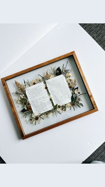 Pressed Flowers | Sustainable Bouquet Preservation on Instagram: "An artful keepsake that combines two perfect elements from such a special day! 

Emily came to us with the idea of placing both her & her husband’s vows in the same frame… she was on to something! Absolutely obsessed with how this custom piece turned out ✨ If there are enough requests we might just have to add this one on the site with a permanent spot <3

This is: 16x20 - Light Wood - Custom Vow Design
Bride: Emily
Florals by @89thandautumn" Framed Vows With Flowers, Wedding Flower Keepsake Ideas, Flower Saving Ideas, Vow Paper, Framed Wedding Vows, Framed Vows, Handwritten Vows, Wedding Photo Walls, Olive Wedding