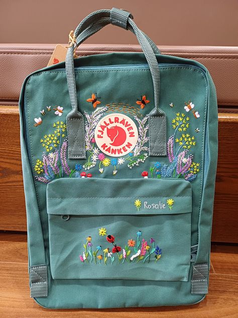 Welcome to my store and choose the perfect hand-embroidered fjallraven kanken backpack   Version & Size + Medium size: 38x27x13cm  + Big size: 42x32x13cm  - Product price includes: hand-embroidered fjallraven kanken backpack and design as shown in the picture - I can make fjallraven kanken backpack hand embroidery patterns according to your ideas - fjallraven kanken backpack will be hand embroidered with thread that won't fade when washed - fjallraven kanken backpack has a small front compartmen Fjallraven Embroidery Diy, Embroidery Backpack Ideas, Kanken Embroidery Ideas, Summer Embroidery Ideas, Embroider Backpack, Kanken Backpack Embroidery, Ladybug Embroidery Design, Embroidered Kanken, Kanken Embroidery