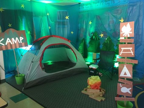 Camping Backdrop Ideas, Camping Theme Parade Float, Camping Theme Photo Backdrop, Tent In Classroom, Reggio Camping Theme, Camp Theme Decor, Camping Room Transformation, Summer Camp Classroom Setup, Camping Book Fair Theme