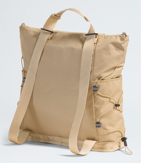 Carry your essentials and more in the super-functional tote version of our iconic Borealis backpack. Bungee compression will help keep your valuables secure. Borealis Backpack, The North Face Borealis, Mens Beach Shirts, Polo Wraps, North Face Borealis, Find My Friends, Waterproof Tote, Bungee Cords, Quick Draw