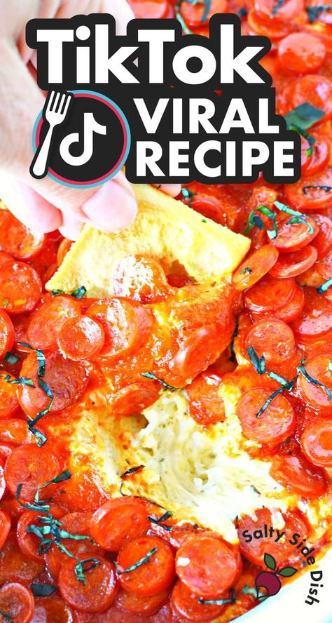 dipping of pepperoni pizza dip. Viral Pizza Dip, Oven Baked Pizza Dip, Appetizers Using Pepperoni, Pizza Dip Video, Pizza Dip With Cottage Cheese, Pepperoni Pizza Dip With Cream Cheese, Pizza Dip With Ricotta Cheese, Pepperoni Dip Crock Pot, Smoked Pizza Dip