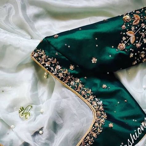 Dark green floral Work blouse Design Inspiration 💖 . Designer - @anu_designs_and_fashions . . . .… Bottle Green Bridal Blouse, Dark Green Bridal Blouse Design, Dark Green Maggam Work Blouse Designs, New Trendy Aari Work Blouse Designs, Maggam Work For Green Blouse, Dark Green Aari Work Blouse Design, Dark Green Pattu Saree Wedding, Green Blouse Designs For Saree Silk, Green Work Blouse Designs