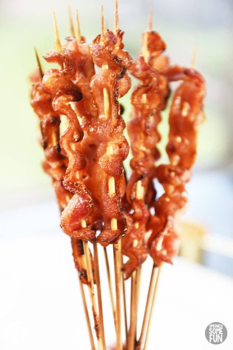 Bacon skewers are a tasty appetizer that is sure to please any bacon lover!   These are a great treat to make for holiday entertaining.  Bacon skewers are perfect for serving at parties or at any meal where you want bacon (which is every meal, right?). #appetizer #baconskewer #holidayappetizer #easyappetizer #bacon #sweetbacon #baconcandy #brownsugarbacon #christmasappetizer #fallappetizer #brownsugarbaconskewer #brunch #brunchrecipe #baconrecipe #recipeswithbacon #recipe Mini Waffle Brunch Ideas, Brunch Recipes Fancy, Bacon Breakfast Appetizers, Sharables Appetizers, Farm Themed Brunch Food, Brunch Pastry Board, Big Sandwiches Parties Food, Finger Foods For Brunch Party, Ladies Brunch Decor