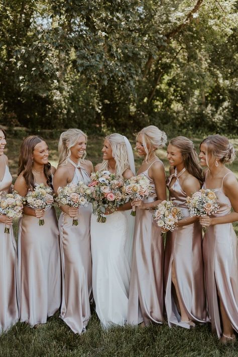 hair style is so nice it looks so good on me Glam Wedding Bridesmaids, Spring Satin Bridesmaid Dresses, Bridesmaid Colors Beach Wedding, Light Cream Bridesmaid Dresses, Six Bridesmaids Photos, Champagne Wedding Colors Summer, Summer Wedding Astethic, Bridesmaid Dresses Late Summer, Champagne Bridesmaid Dresses With Pink Flowers