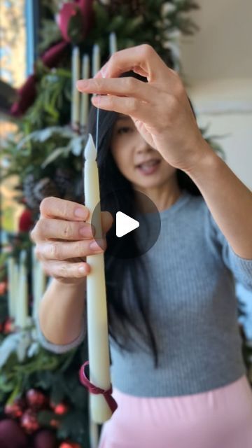 Chelsea on Instagram: "A tutorial on how I hang the candles on the tree. I tied a fishing line on the "flame" part of the candle, then hang it like an ornament on the tree branch. My tips for decorating a tree like this is to bundle 5-7 candles together and only use the candles as lights on the tree. It will give the candles all the spot lights when lit. #decoratewithme #christmasdecor #christmasideas #christmastree #christmasdiy #candlechristmastree" Floating Candles Christmas Tree, Taper Candles Christmas Tree, Wreaths Hanging From Branch, Hanging Taper Candles, Christmas Tree Candle Lights, Christmas Table Ideas Elegant, Candles For Christmas Tree, Candle On Christmas Tree, Hanging Candles Christmas