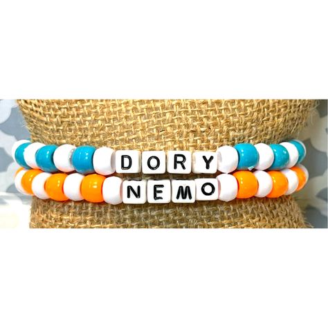 Set Of 2 Dory And Nemo Bead Friendship Bracelet Osfm Nwt Features: 1 Bead Bracelet That Says Dory With White & Blue Plastic Beads *1 Bead Bracelet That Says Nemo With Orange & White Plastic Beads *One Size Fits Most *Handmade By My Daughter To Make Extra Money *New Bundle & Save... Reasonable Offers Welcome! Check Out Our Other Handmade Bracelets And More Thing One And Thing Two Bracelets, Thing 1 Thing 2 Bracelets, Clay Beads Friendship Bracelet Ideas, The Office Bracelets, Beaded Bff Bracelets, Best Friend Bead Bracelet Ideas, Bsf Clay Bead Bracelets, Rod Wave Bracelets, Clay Bead Bracelet Ideas Lilo And Stitch