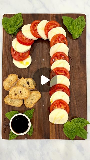 Maegan Brown ~ The BakerMama on Instagram: "❤️🤍 Candy Cane Caprese Board ❤️🤍 a simple and stunning way to serve an appetizer during the holidays! 🎄🍅🧀 It only requires a few ingredients and comes together in a matter of minutes so you can spend more time with your loved ones this holiday season. 

Comment “recipe” and I’ll DM you the link! or tap the link in profile @thebakermama for all the board building details. Follow for more festive recipes and ENJOY! ❤️ #TheBakerMama #BoardsByTheBakerMama

https://thebakermama.com/recipes/caprese-candy-cane-board/

#caprese #candycanecaprese #candycane #christmasappetizer #holidayappetizer #cheeseboard #cheeseplatter #christmascaprese #christmas #christmasfood #christmasrecipe #christmasideas #merrychristmas #candycane #christmassnacks" Candy Cane Caprese Board, Caprese Candy Cane, Caprese Board, Xmas Appetizers, Party Food Bars, Christmas Finger Foods, Building Details, Xmas Desserts, Festive Recipes