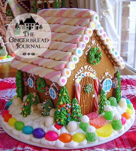 gingerbread house for Christmas, www.gingerbreadjournal.com; lots of tutorials! Homemade Gingerbread House, Gingerbread House Ideas, Gingerbread House Candy, Ginger Bread House Diy, Cool Gingerbread Houses, Gingerbread House Template, Gingerbread House Parties, Gingerbread House Designs, Different Pictures