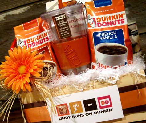 Here's a gift basket for the die hard Dunkin' Donuts fan! Small Prize Basket Ideas, Dunkin Gift Basket, Dunkin Donuts Gift Basket, Jack And Jill Basket Ideas Raffle Prizes, Raffle Basket Ideas Fundraising Cheap, Donut Gift Basket, Tricky Tray Basket Ideas, Tricky Tray Baskets, Raffle Basket Ideas