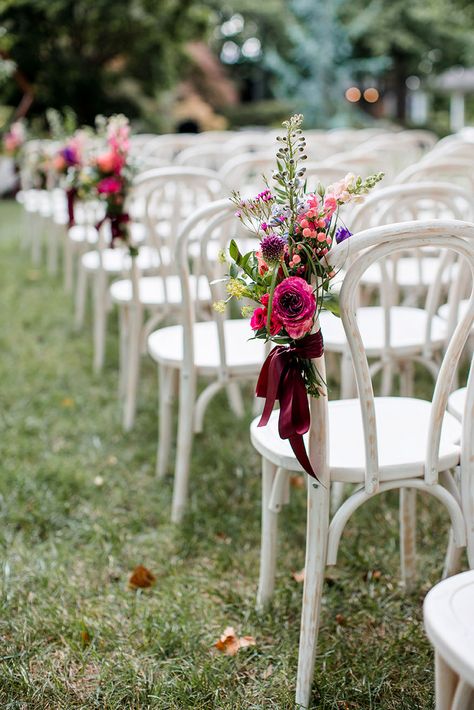 Wedding With White Chairs, Outdoor Wedding Chair Decorations, Ceremony Aisle Markers, Colorful Flower Arrangements, Outside Wedding Ceremonies, Wedding Ceremony Chairs, Ceremony Decorations Outdoor, Wedding Aisle Outdoor, Ceremony Arrangement