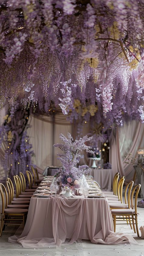 Elegant lavender dreamscape: Dive into a floral fantasy with cascading wisterias for a wedding reception that feels like a fairy tale. Garden Themed Wedding Ceremony, Fairy Garden Ideas Wedding, Lavender Center Piece Wedding, Fairy Wedding Venue Ideas, Floral Theme Wedding Decoration, Wedding Ideas Purple And Gold, Fairy Tail Wedding Decoration, Wisteria Flowers Wedding, Hidden Garden Wedding