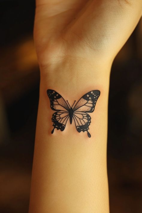 butterfly-tattoo Butterfly Thumb Tattoo, Butterfly Forearm Tattoo Women, Sideways Butterfly Tattoo, Butterfly Tattoo Forearm, Realistic Butterfly Tattoo, Butterfly Tattoo Ideas, Thumb Tattoos, Butterfly Wrist Tattoo, Tattoo Lettering Design