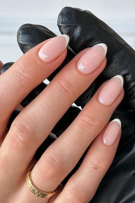 33 Essential 2024 Nail Trends to Try Right Now Almond Gel French Tip, French Tips Almond With Design, French Nails Shape, Minimalist Nails French, Nails To Get Proposed To, Minimalist Nails Wedding, Minimalistic French Nails, Almond Nails 2024 Trends, White French Gel Nails