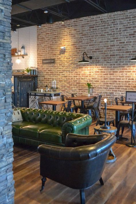 Coffee shop design ideas: gooseneck lighting, wood tables, leather couch, fireplace #coffeeshop #restaurantdesign #cafedesign Rustic Coffee Shop, Café Design, Coffee Shop Interior Design, Cozy Coffee Shop, Design Café, Industrial Coffee, Coffee Shop Aesthetic, Coffee Shops Interior, Modern Restaurant