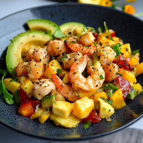 Avocado Mango Shrimp Salad 🥑🥭🍤 Ingredients: 2 ripe avocados 🥑 1 ripe mango 🥭 200g cooked and peeled shrimp 🍤 1 small red onion 🧅 Juice of 2 limes 🍋 2 tablespoons extra virgin olive oil 🫒 Salt and ground black pepper, to taste 🧂 Fresh coriander leaves, to garnish 🌿 Fresh red chilli (optional, for a little heat) 🌶️ Instructions: 🥑 Cut the avocados in half, remove the pits and peel them. Slice or dice them according to your preference and place them in a salad bowl. 🥭 Peel and dice the mango, th... Mango Shrimp Salad, Ripe Mango, Onion Juice, Shrimp Salad, Coriander Leaves, Ripe Avocado, Red Chilli, Virgin Olive Oil, Salad Ingredients