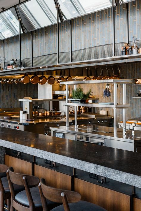 an open kitchen with a counter lined with stools Open Kitchen Design Restaurant, Open Kitchen Bar Design, Open Kitchen Cafe, Open Kitchen Bar, Kitchen Restaurant Design, Open Kitchen Restaurant, Restaurant Kitchen Design, Bar Restaurant Design, Commercial Kitchen Design