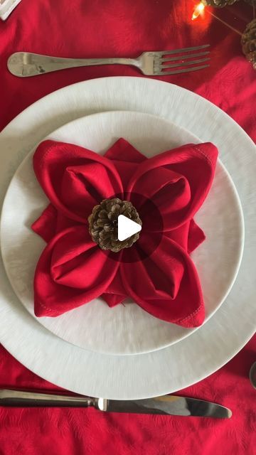 Manuela Mazzocco on Instagram: "✨Poinsettia Napkin Fold✨
Elevate your holiday gatherings with a touch of seasonal charm by incorporating the enchanting Poinsettia Napkin Fold into your Christmas dinner table decor
Find this and several more napkin folds in my website. Link in profile. DM/comment for more 
#napkinfold #tutorial #howto #napkin #tabledecor #holidaytable" Fold Napkins Into Christmas Trees, Diamond Pocket Napkin Fold, Napkin Folding Ideas With Flowers, Poinsettia Napkin Folding, Napkin Folding Ideas In Bowl, Cloth Napkins Folding With Ring, Cute Napkin Folding, Christmas Decor Ideas For Dinner Table, Napkins Christmas Ideas