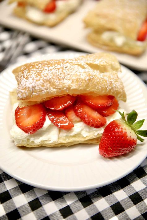 Easy Strawberry Napoleons are a delicious dessert that everyone will love. Flaky puff pastry layered with the easiest pastry cream and fresh strawberries. Puffed Pastry Strawberry Dessert, Strawberries And Cream Puff Pastry, Puff Pastry And Strawberry Recipe, Puff Pastry Strawberry Shortcake, Strawberry Desserts Puff Pastry, Puff Pastry With Strawberries, Strawberry Napoleon Puff Pastries, Puff Pastry Sheet Recipes Desserts, Strawberry Puff Pastry Recipes