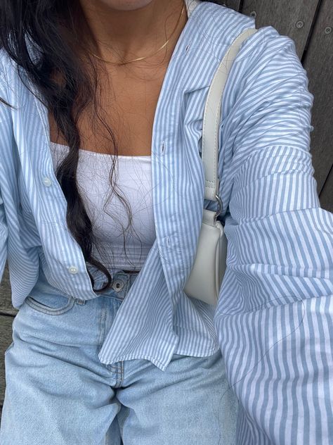 White Shirt And Light Blue Jeans Outfit, Blue Shirt Inspo Outfit, Tops For Light Blue Jeans, Blue And White Chemise Outfit, Light Blue Old Money Aesthetic, Light Blue Jeans Summer Outfit, Striped Cropped Shirt Outfit, Blue Jeans Blue Shirt Outfit, Light Blue Shirt Aesthetic