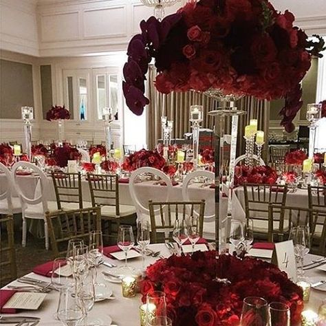 Striking red and white tablescape beauty with @lourdesmilian. Love the red orchid and rose blend. #LourdesMilian #red #redwedding #redweddingdecor #weddingdecor #weddingflowers #weddingtables #centerpieces #floral #flowers #redroses #roses #orchids #getti Flower Centrepiece Wedding, Centrepiece Wedding, Wedding Flower Decor, Flower Centrepiece, Rose Blend, White Tablescape, Red Orchid, Centerpieces Floral, Wedding Centrepiece