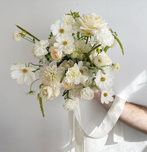 photo dump of a whimsy & elegant white + green wedding. save for inspo 💌 scroll to see all of the sweet bouquets 🥰 Venue: @bundaleer Florist: @beesblossomsfloralstudio Hair: @eliseannhair MUA: @sabrinawalsh_mua Photographer: @everymomentcollective Cake: @wildcanaryeat Dress: @janehillbridal Celebrant: @venitamanningcelebrant Music: @elevationliveband Unique White Flower Bouquet, Garden Flowers Wedding Bouquet, White Organic Bridal Bouquet, White Garden Bouquet Wedding, White Wedding Bouquets With Pop Of Color, Wedding Flowers Color Schemes, White Wedding Flowers With Greenery Bridesmaid Bouquets, White Gardenia Bouquet, Summer White Wedding Flowers