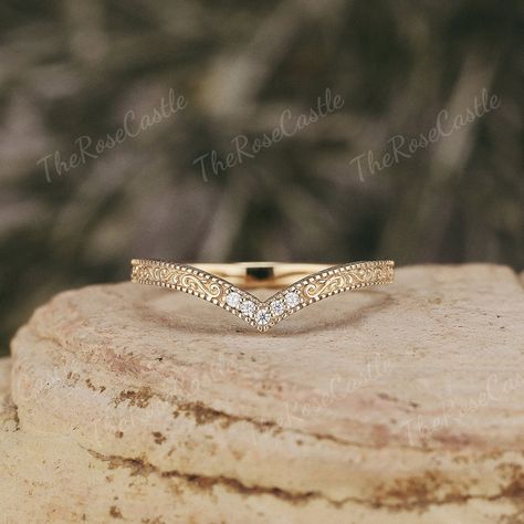 Moissanite Curved Wedding Band Vintage Solid Gold Filigree Pattern Moissanite Stacking Ring Matching Wedding Ring  Promise Rings For Women ITEM DETAILS ●Available in yellow, white or rose solid 10k, 14k or 18k gold. This ring can be made in Platinum. ❀❀Wedding band  Stone: Moissanite Shape: Round shape Weight: 0.034ct Band width around 1.5mm Visit my shop for more jewelry: https://www.etsy.com/shop/TheRoseCastle if you would like to customize your unique ring, you may contact us about your ideas Curved Wedding Band For Marquise Ring, Curved Wedding Band With Engagement Ring, Gold Wedding Ring Stack, Marquise Diamond Ring Settings, Matching Wedding Ring, Spring Elopement, Gold Wedding Bands Women, Random Products, Wedding Band Vintage