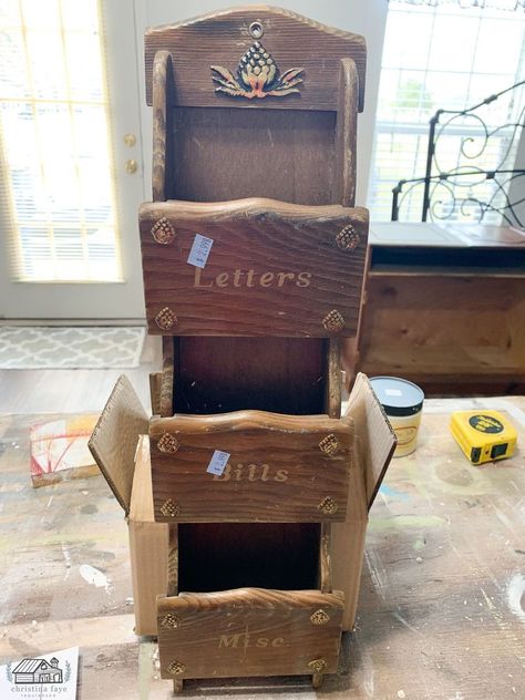 One of my favorite ways to save money is repurposing thrift store items to use as part of my home décor. Old wood mail sorters are an easy DIY project and can be found for cheap! Like this one, I repurposed a few months back. You can see it HERE.I found this one for $1.50. It was marked at $2.99 but it was the color of the day, so I scored it for 50% off. Even though it was outdated and had a few dings, it could still be saved! And what’s going on with those gold accents? Eeekk!   For… Wood Basket Decor Ideas, Thrift Repurpose, Vintage Repurposed Items, Mail Sorters, Thrift Store Diy Projects, Mail Sorter, Thrift Store Diy, Thrifted Home, Wood Items