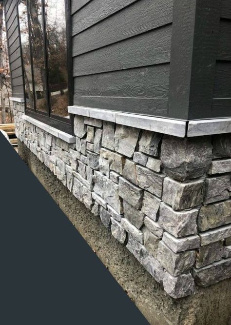 Dark Rock House Exterior, Dark Grey And Brick Exterior, Dark Siding House Exterior Colors With Stone, Gray Brick Skirting, House Rock Exterior, Bottom Of House Exterior Ideas, Black And Cedar House Exterior With Stone, Textured Siding Exterior, Rock On Outside Of House