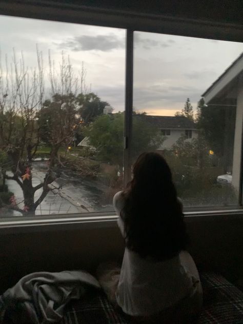 Sitting In Room Aesthetic, Window Scenery Aesthetic, Bed Near Window Aesthetic, I Look In Peoples Windows Aesthetic, Sit By The Window, City View Apartment Night Window Rainy, Girl In Window Aesthetic, I Look In Peoples Windows, Staring Out The Window Aesthetic