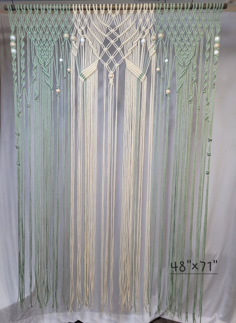 Beautiful handmade boho macrame curtain that can used as a wedding backdrop and/or door curtain.🖤  This can be customized in color and size.  If your size needed is not listed just message me.  This listing shows a 2 color light sage and natural cord combination with white and natural wood beads and a dark walnut stained dowel that measures 35.5" wide and 74" long.    This  listing includes an unfinished wood dowel along with natural and white wood beads and the complete macrame will be the one color which you pick off the color chart.  Just message me with any other customizations.  Please make sure your notifications are on so that I can message you with verification of details. Macrame Photo Backdrop, Macrame Door, Macrame Door Curtain, Curtain Macrame, Boho Backdrop, Boho Style Decor, Photo Backdrop Wedding, Macrame Backdrop, Backdrop Wedding