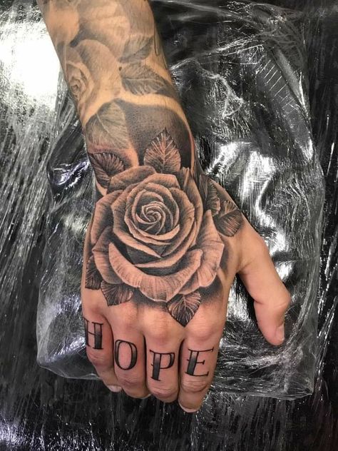 Tattoo Rose On Hand, All Hand Tattoo Man, Manly Hand Tattoos, Roses Tattoo Hand, Men Hand Rose Tattoo, Full Sleeve Rose Tattoos For Guys, Rose Tattoo Design On Hand, Rose Tattoo On The Hand, Hand Rose Tattoos For Guys