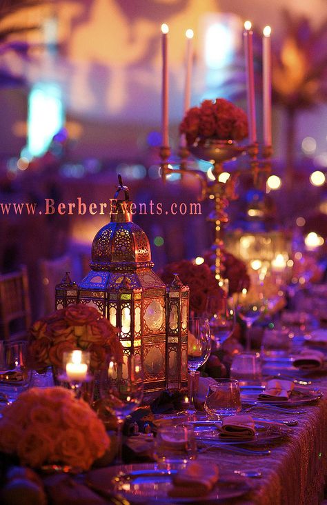 Moroccan Theme Birthday party. Loads of soft lights with purples and golds. Moroccan Dinner Party Table Settings, Morrocan Theme, Moroccan Theme Party, Wedding Party Beach, Aladdin Wedding, Arabian Party, Arabian Theme, Arabian Nights Theme, Arabian Wedding