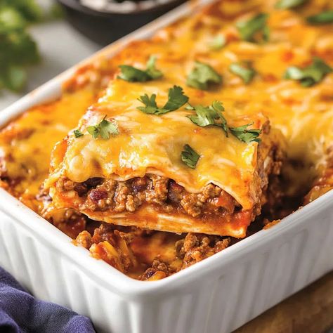 Beef Enchilada Bake Recipe - emiliarecipes.com Baked Enchiladas Beef, Enchilada Bake Beef, Beef Enchilada Bake, Baked Enchiladas, Ground Beef Beans, Enchiladas Beef, Beef Enchilada Casserole, Beans And Cheese, Veggie Enchiladas