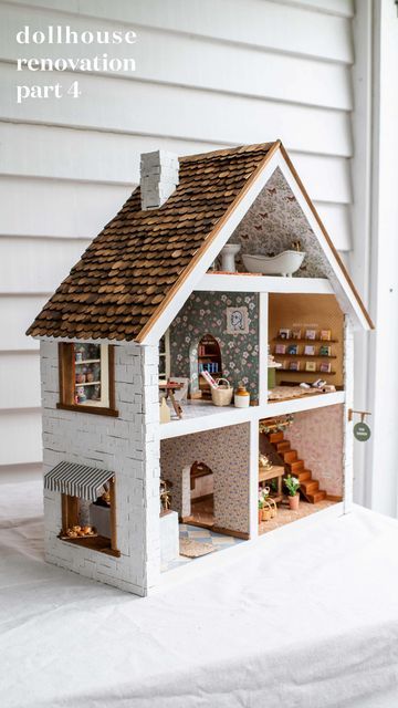 Geneva Vanderzeil on Instagram: "THIS YEAR’S DOLL HOUSE - THE BIG REVEAL AND A HOUSE TOUR! The theme this year was plant shop, cafe, craft room and book store - and I have to say I’m really happy with it! Honestly it’s been such a rollercoaster, but that was to be expected when I decided to do it with a Christmas deadline, and the highest possible standards. The part that makes me most happy about this is that I found that it was possible to transform a secondhand A frame dollhouse into something really unique and interesting. So you don’t need a family heirloom to get started! And it didn’t really cost that much to do it, because all the materials are simple craft supplies. IF you ignore how much money I spent on tiny pastries and a mini pour over coffee stand (which isn’t that essential Pour Over Coffee Stand, Playhouse Interior, Big Doll House, Large Dolls House, Dollhouse Family, Dolls House Shop, Coffee Stand, Revamp Furniture, Clapboard Siding